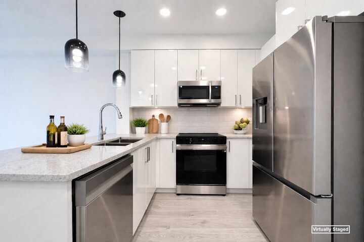 Property Photo: 5504 Brydon Crescent 408 BC V3A 0R3
