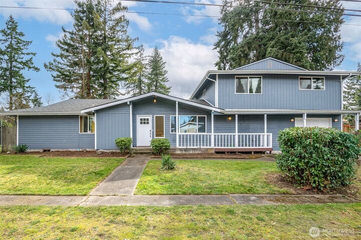 Property Photo:  402 E 91st Street  WA 98445 