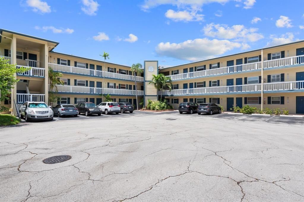 Property Photo:  1400 NE 57th Court 207  FL 33334 