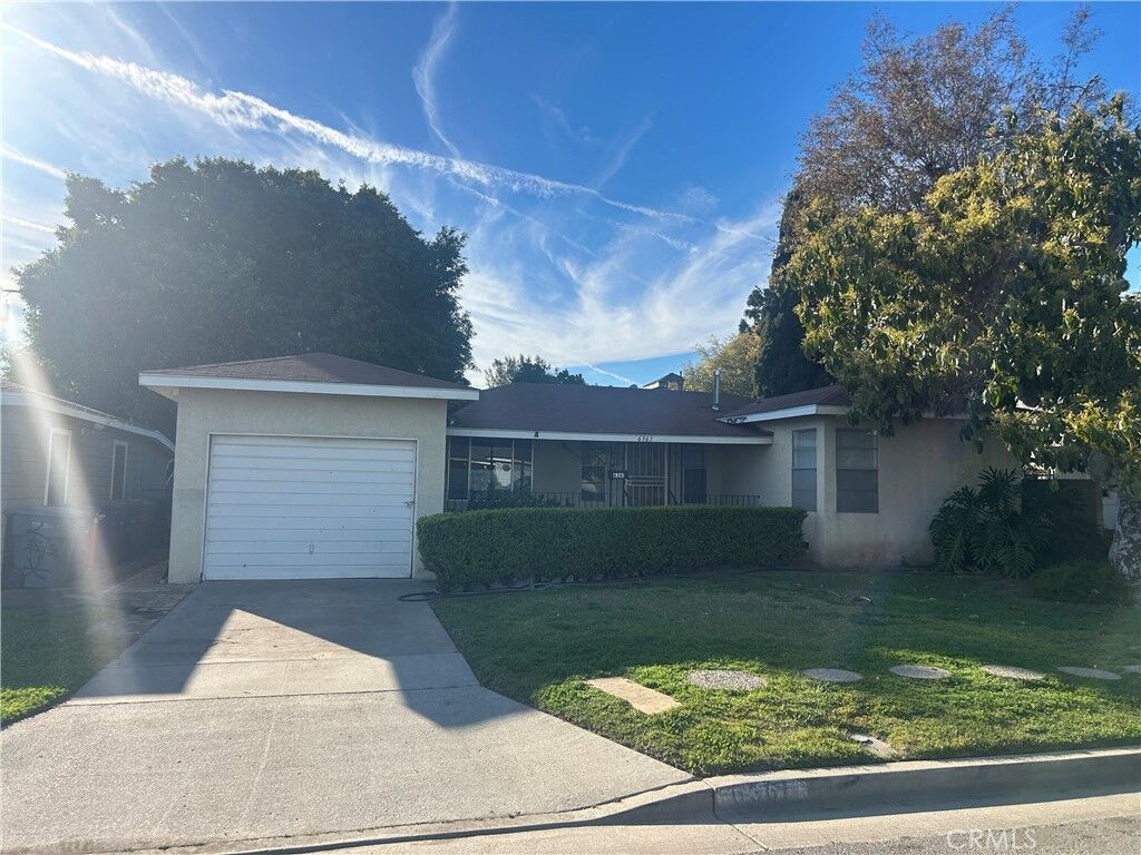 Property Photo:  6361 Los Robles  CA 90621 