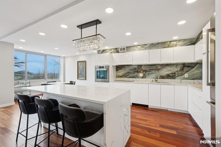 Property Photo:  1 Claridge Drive 104  NJ 07044 