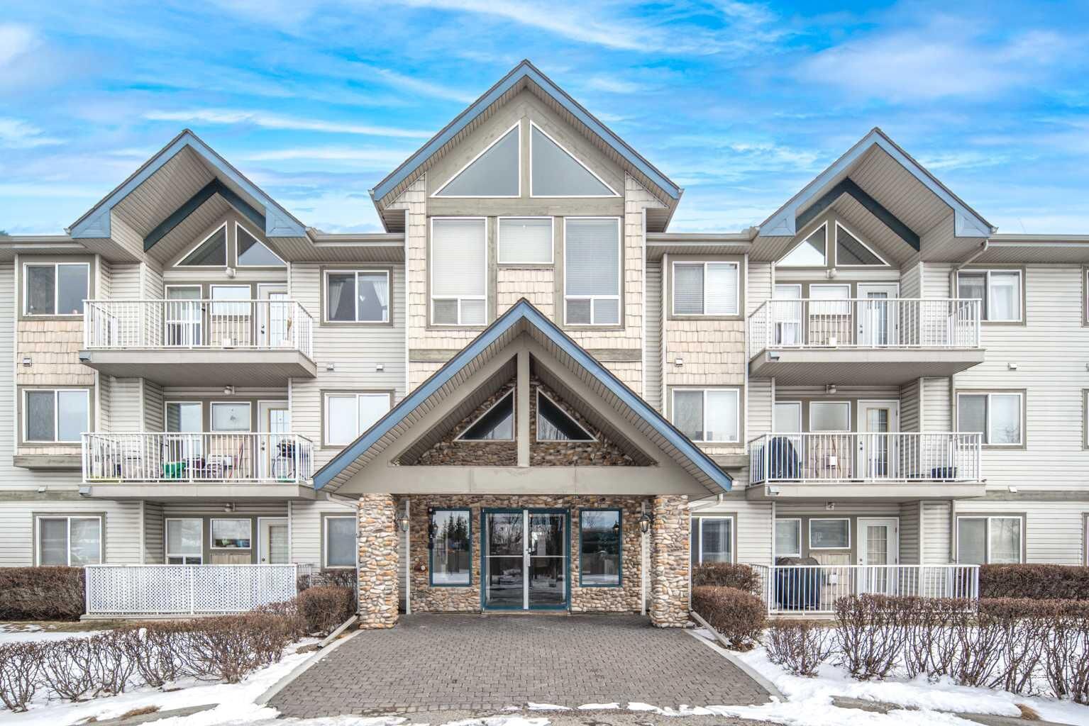 Property Photo: 7 Harvest Gold Manor NE 313 AB T3K 4Y3