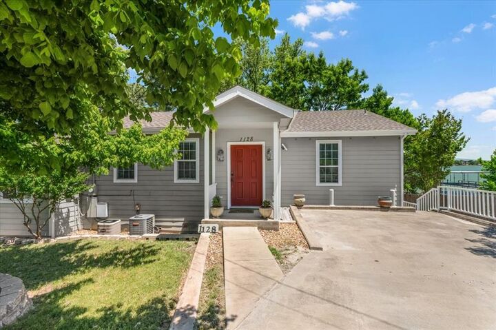 Property Photo: 1128 W Lake Drive TX 76087