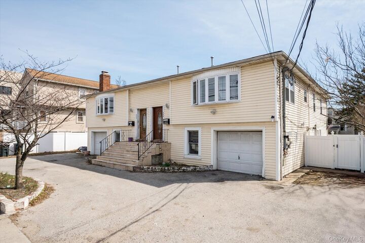 Property Photo:  569 Peninsula Boulevard  NY 11516 