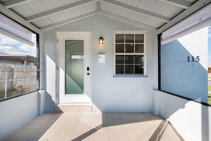 Property Photo:  115 SE 2nd 1-2  FL 33009 