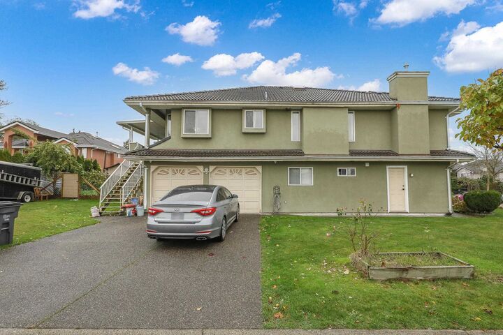 Property Photo:  12255 64A Avenue  BC V3W 3R8 