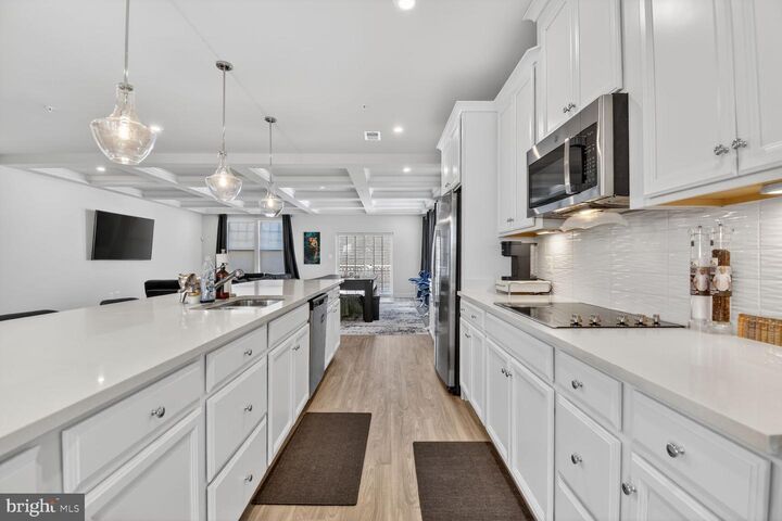 Property Photo:  7652 Buzz Aldrin Lane 1826  MD 20706 