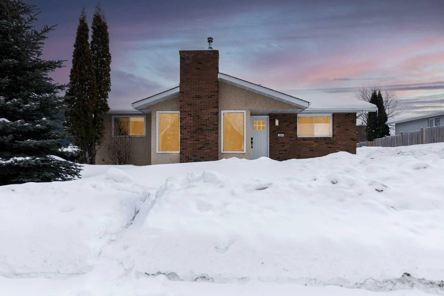 Property Photo:  209 Woodland Drive  AB T9K 1A4 