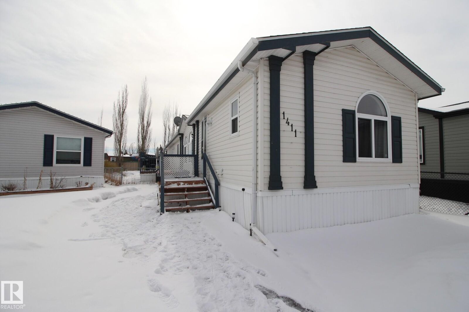 Property Photo:  53222 RR 272 1411  AB T7X 4M4 