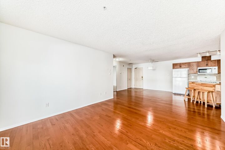 Property Photo:  16303 95 Street NW 105  AB T5Z 3V1 