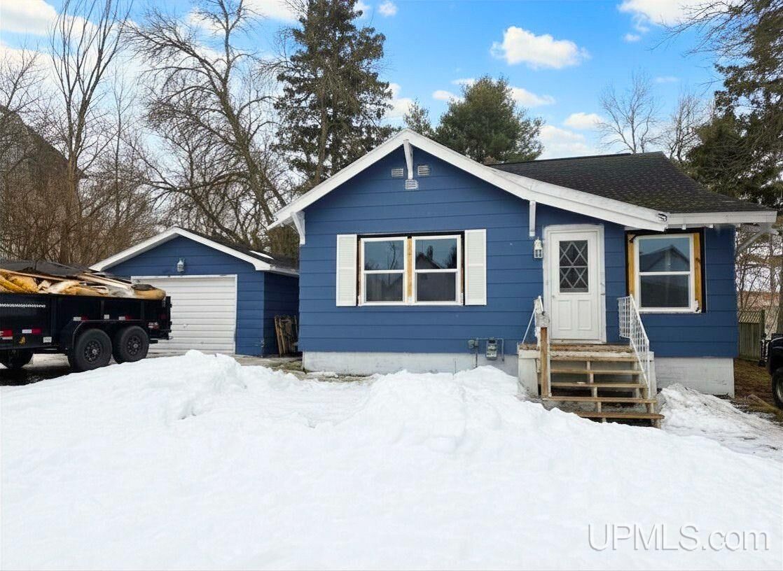 Property Photo:  210 Blossom Street  MI 49935 