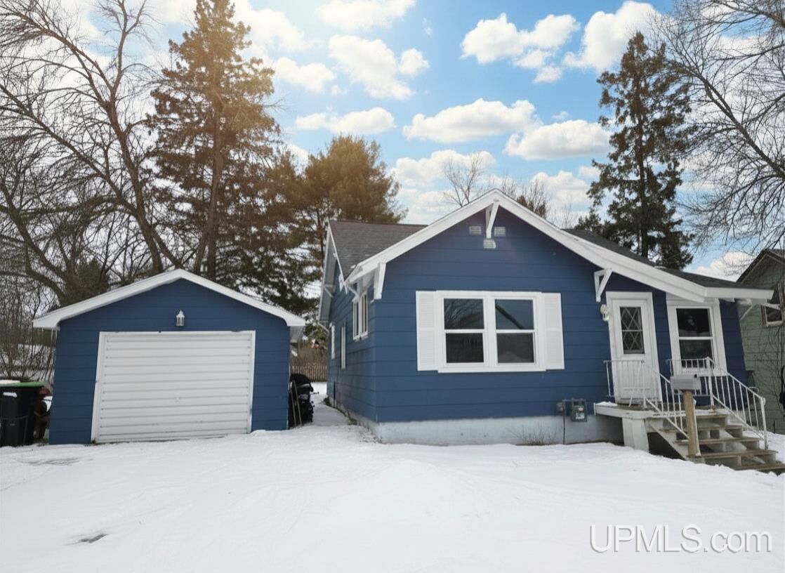 Property Photo:  210 Blossom Street  MI 49935 