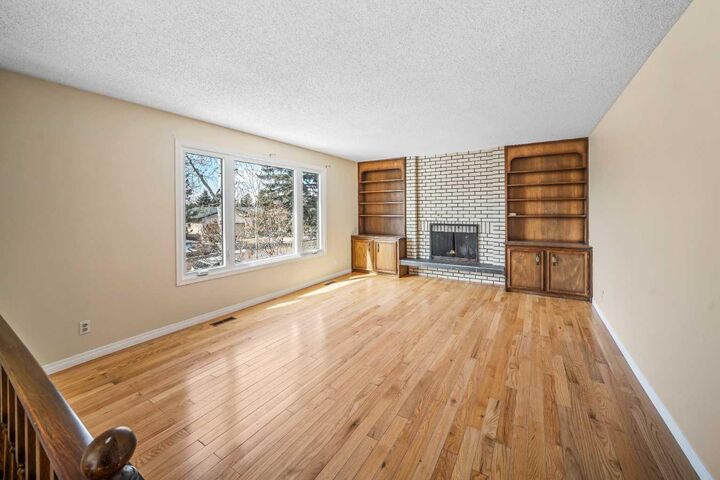 Property Photo:  408 Queen Charlotte Drive SE  AB T2J 4H3 