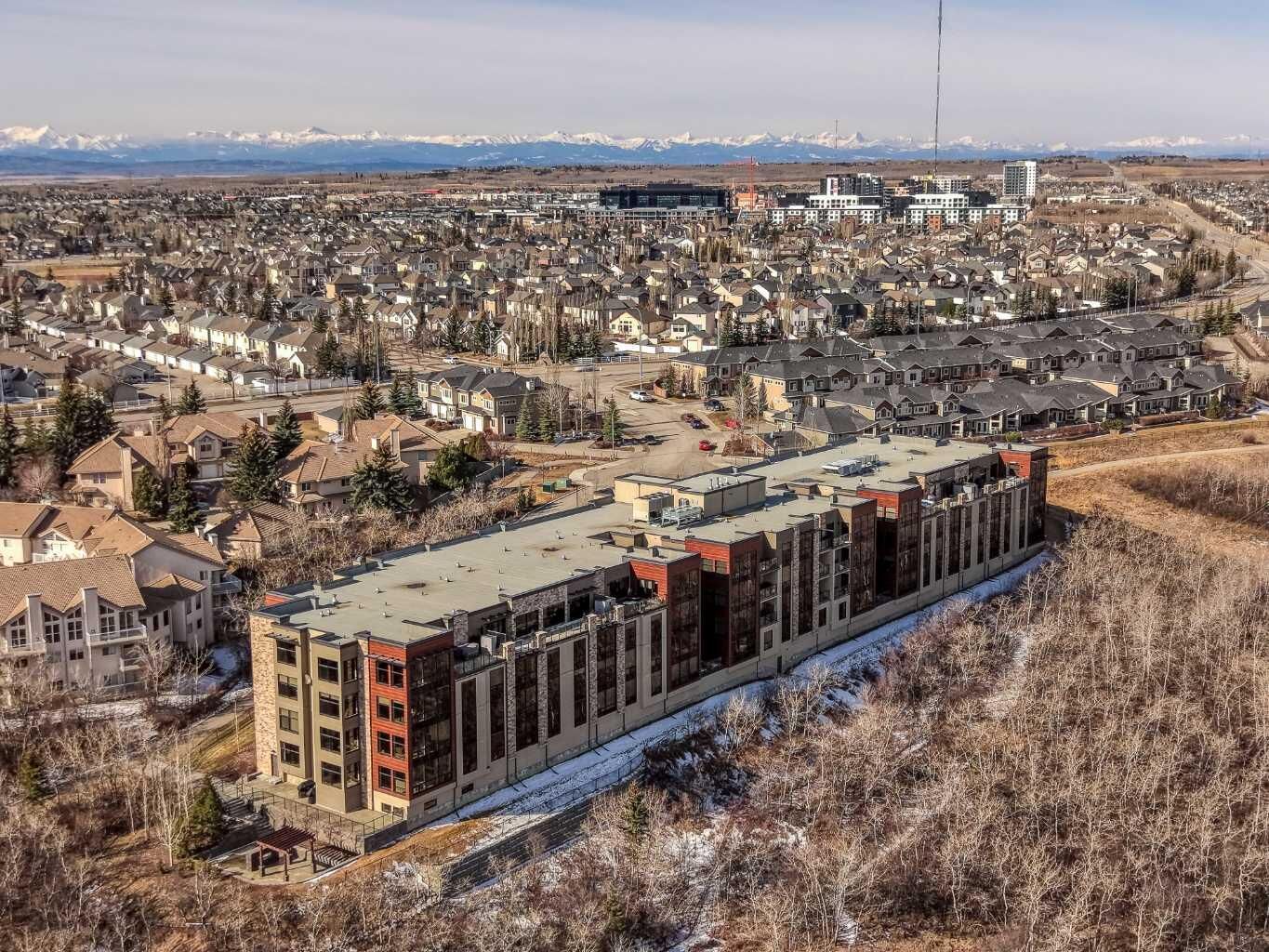 Property Photo:  15 Cougar Ridge Landing SW 108  AB T3H 6C3 