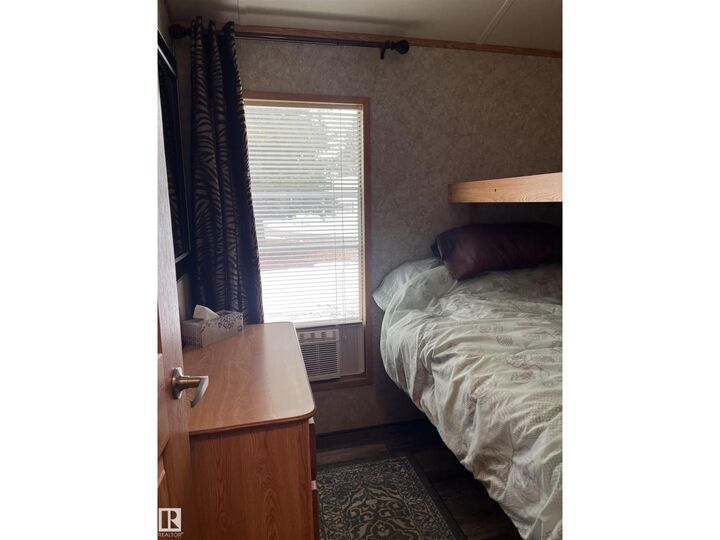 Property Photo:  1030 35468 Range Road 30  AB T4G 0M3 