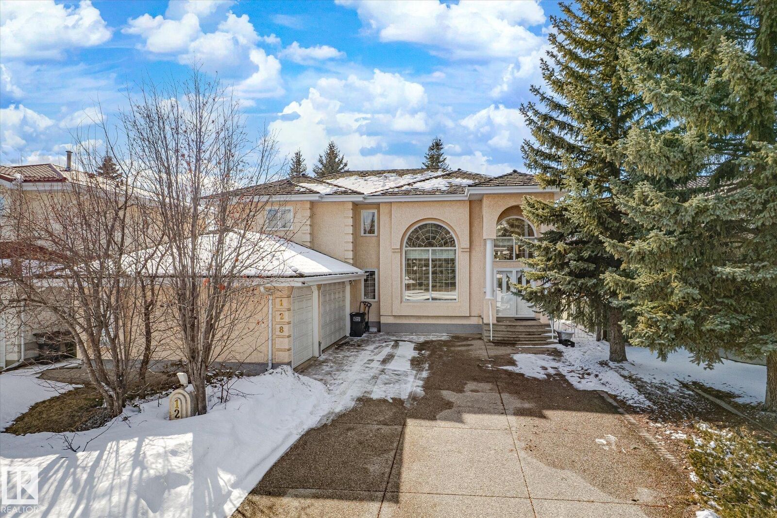 Property Photo: 128 Weaver Drive NW AB T6H 2J3