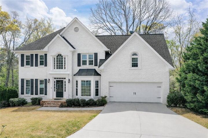 Property Photo:  4910 Red Robin Ridge  GA 30022 