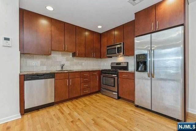 Property Photo:  17 Meadow Road 104  NJ 07070 