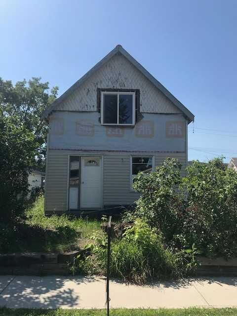 Property Photo:  10306 101 Street  AB T8S 1K1 