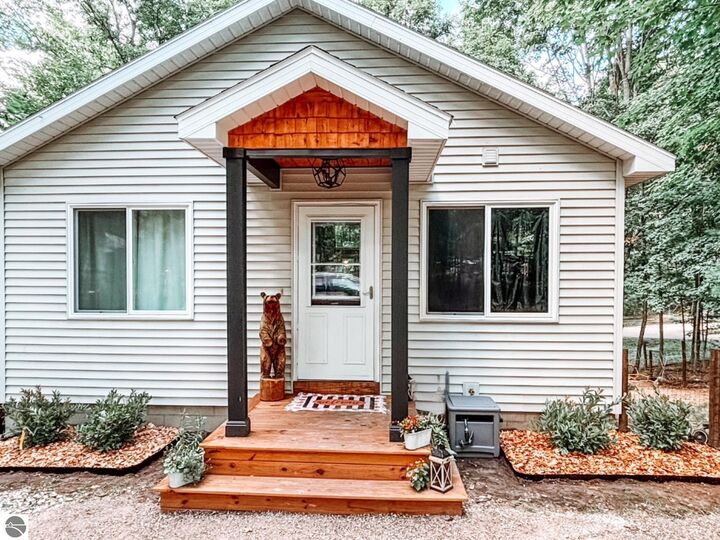 Property Photo:  6424 Fourth Street  MI 49650 