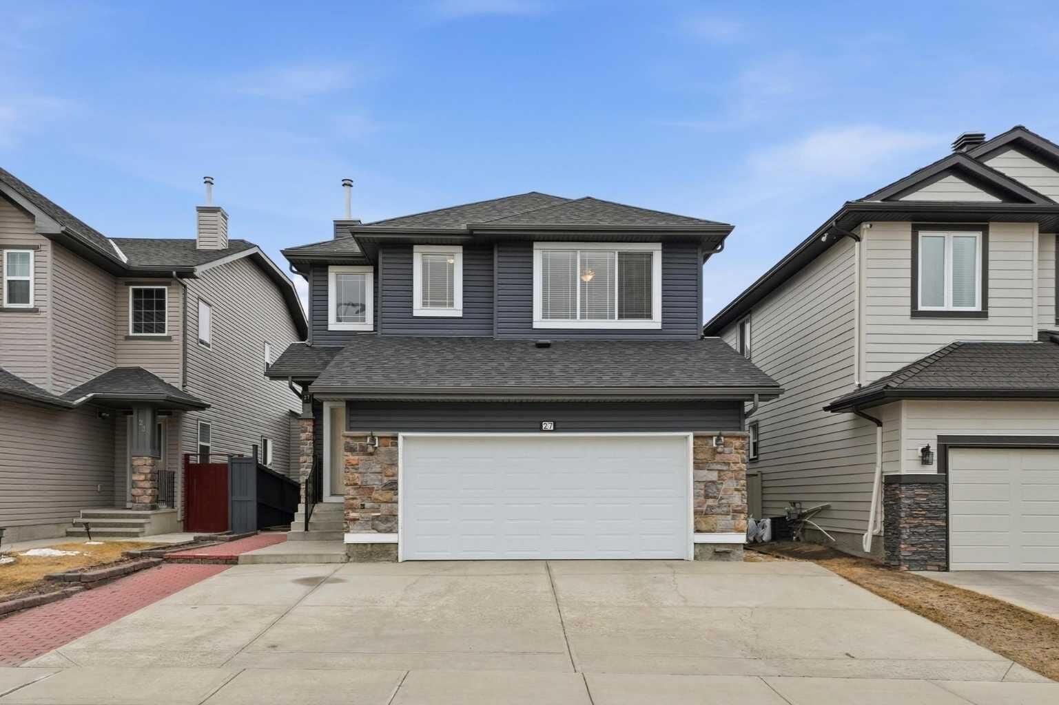 Property Photo: 27 Saddleland Way NE AB T3J 5K6