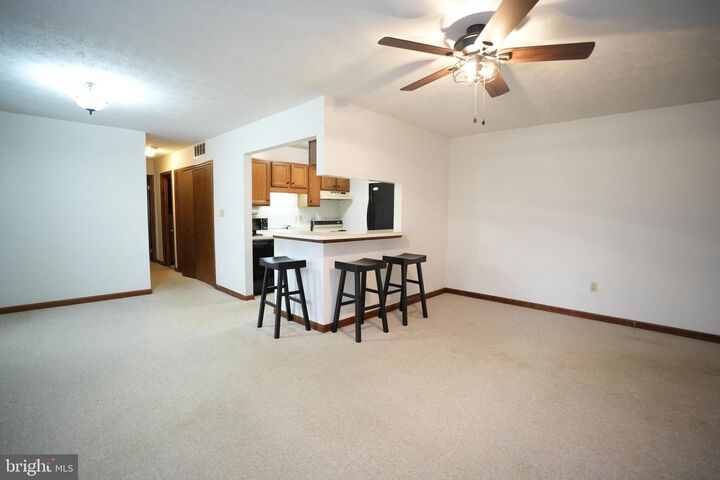 Property Photo:  23239 Rosewood Court A-11  MD 20619 