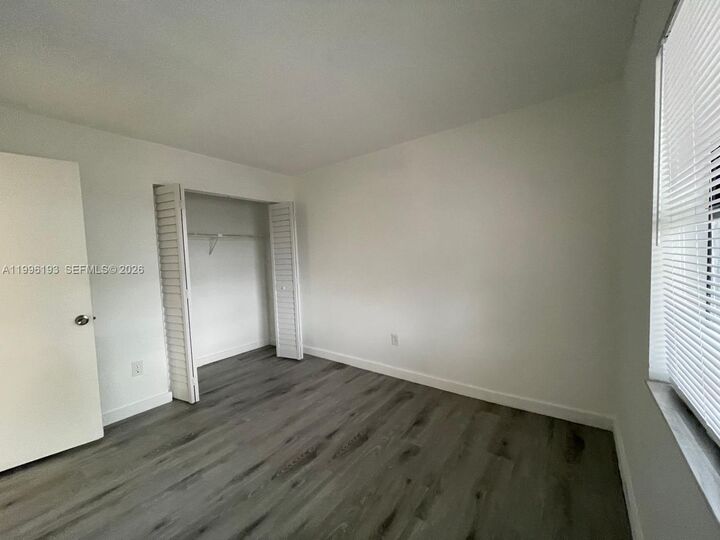 Property Photo:  861 NE 209th Ter 204-24  FL 33179 