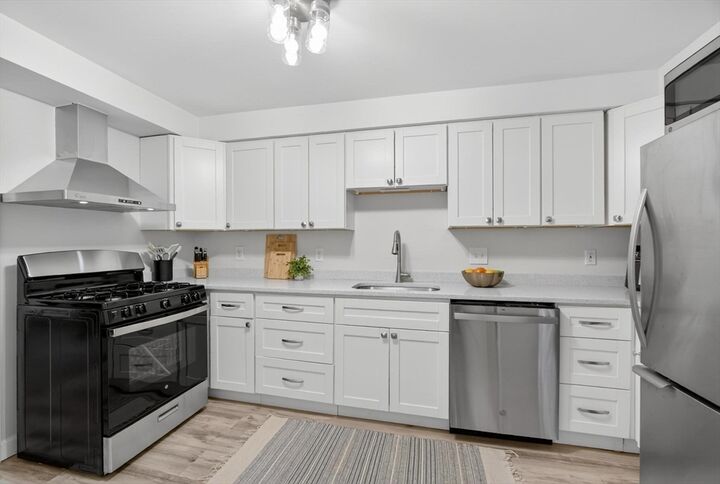 Property Photo:  1461 Pawtucket Blvd 4-8  MA 01854 