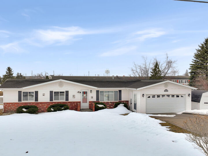 Property Photo:  216 Riverside Drive  MI 49721 
