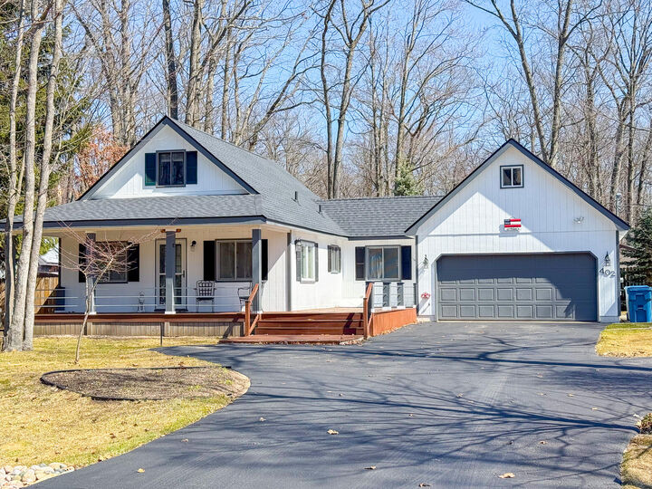 Property Photo:  402 Sheffield Drive  MI 48653 