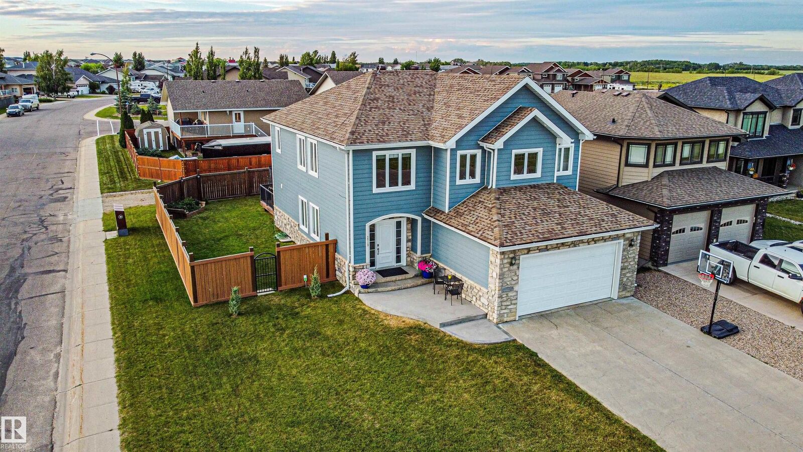 Property Photo: 3719 Lakeshore Drive AB T9N 0A4