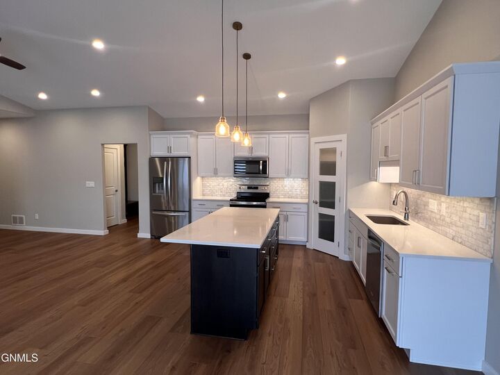 Property Photo:  221 Colt Avenue  ND 58503 