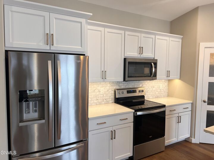 Property Photo: 221 Colt Avenue ND 58503