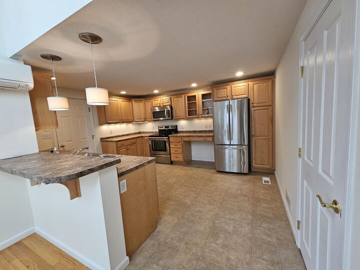 Property Photo:  33 Heritage Drive 10-9  ME 04090 