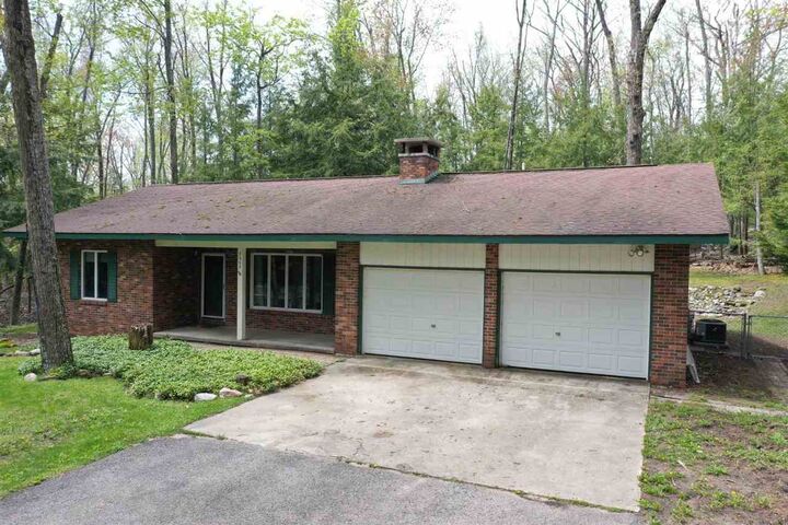 Property Photo: 7505 Tamarac MI 49740