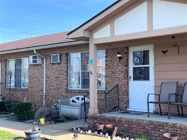 Property Photo:  61035 Eleven Mile Road 4  MI 48178 