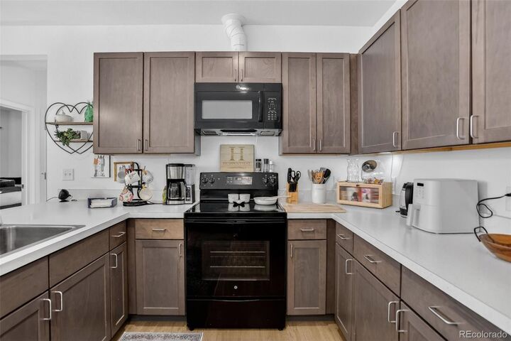 Property Photo:  8475 E 36th Avenue 221  CO 80238 