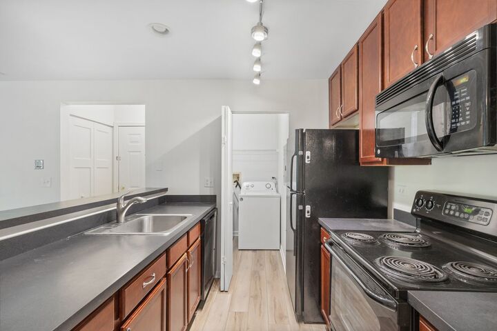 Property Photo:  104 Glengarry Drive 206  IL 60108 