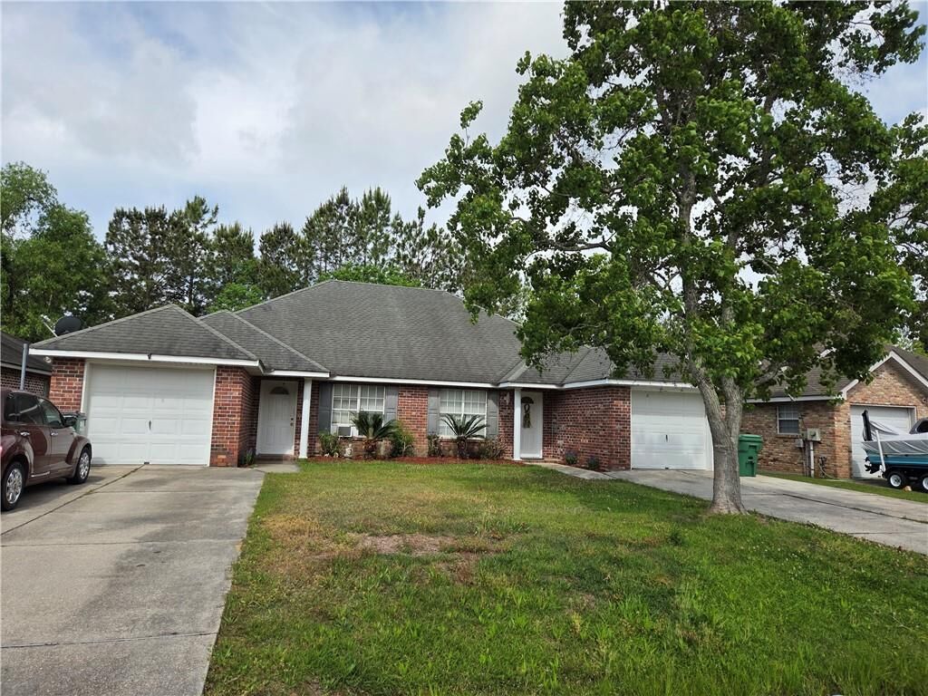 Property Photo:  149-155 Remmy Court  LA 70448 