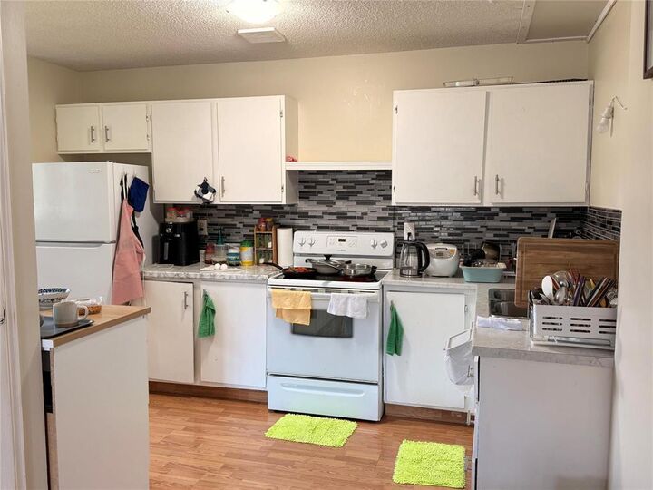 Property Photo:  955 Summerside Avenue  MB R3T 4Y1 