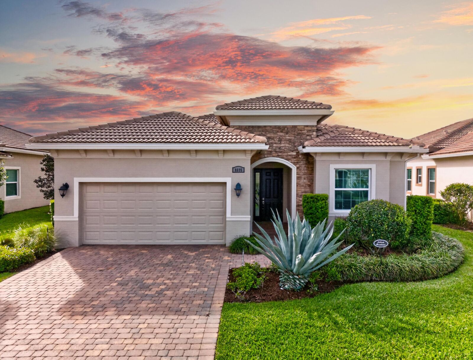 Property Photo: 8695 SW Carrara Way FL 34987
