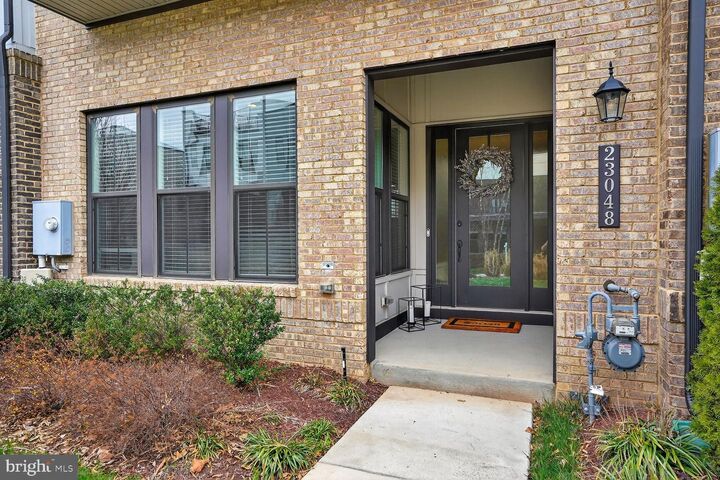 Property Photo: 23048 Lavallette Square VA 20148