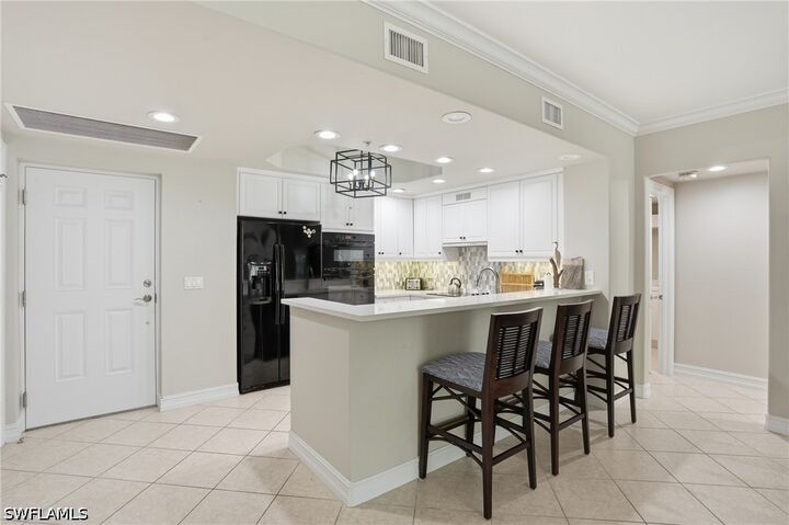 Property Photo:  2738 Tiburon Boulevard E B104  FL 34109 