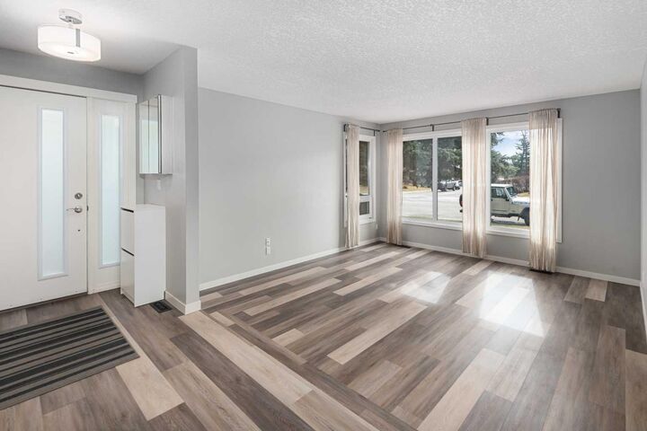 Property Photo:  51 Woodmont Road SW  AB T2W 4L6 