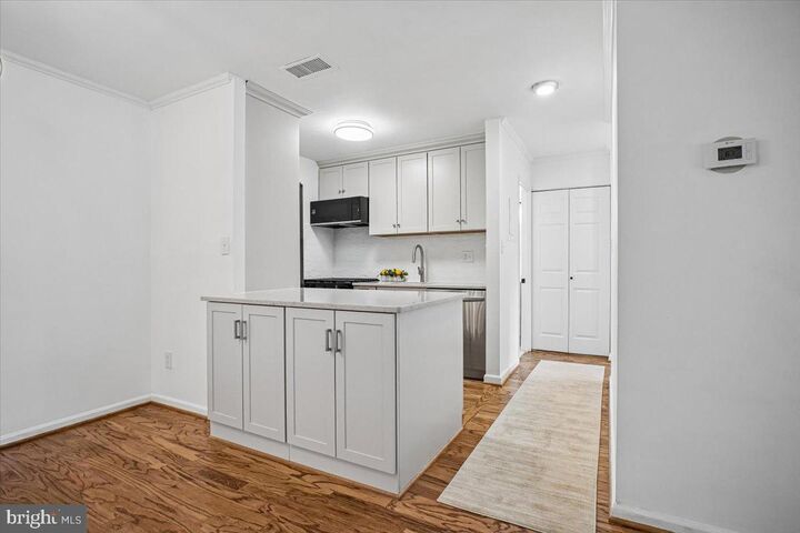 Property Photo:  5800 Cove Landing Road 304  VA 22015 