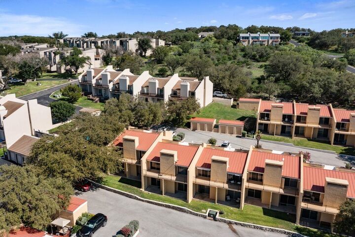 Property Photo:  402 Hi Stirrup E4  TX 78657 