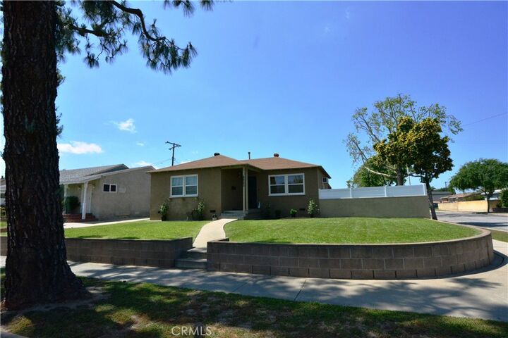 Property Photo:  8903 Songfest  CA 90660 
