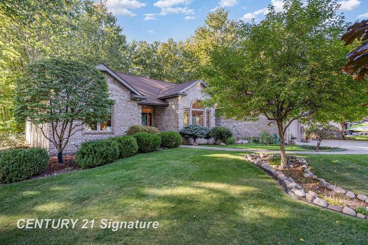 Property Photo:  581 Timberwood Lane  MI 48609 