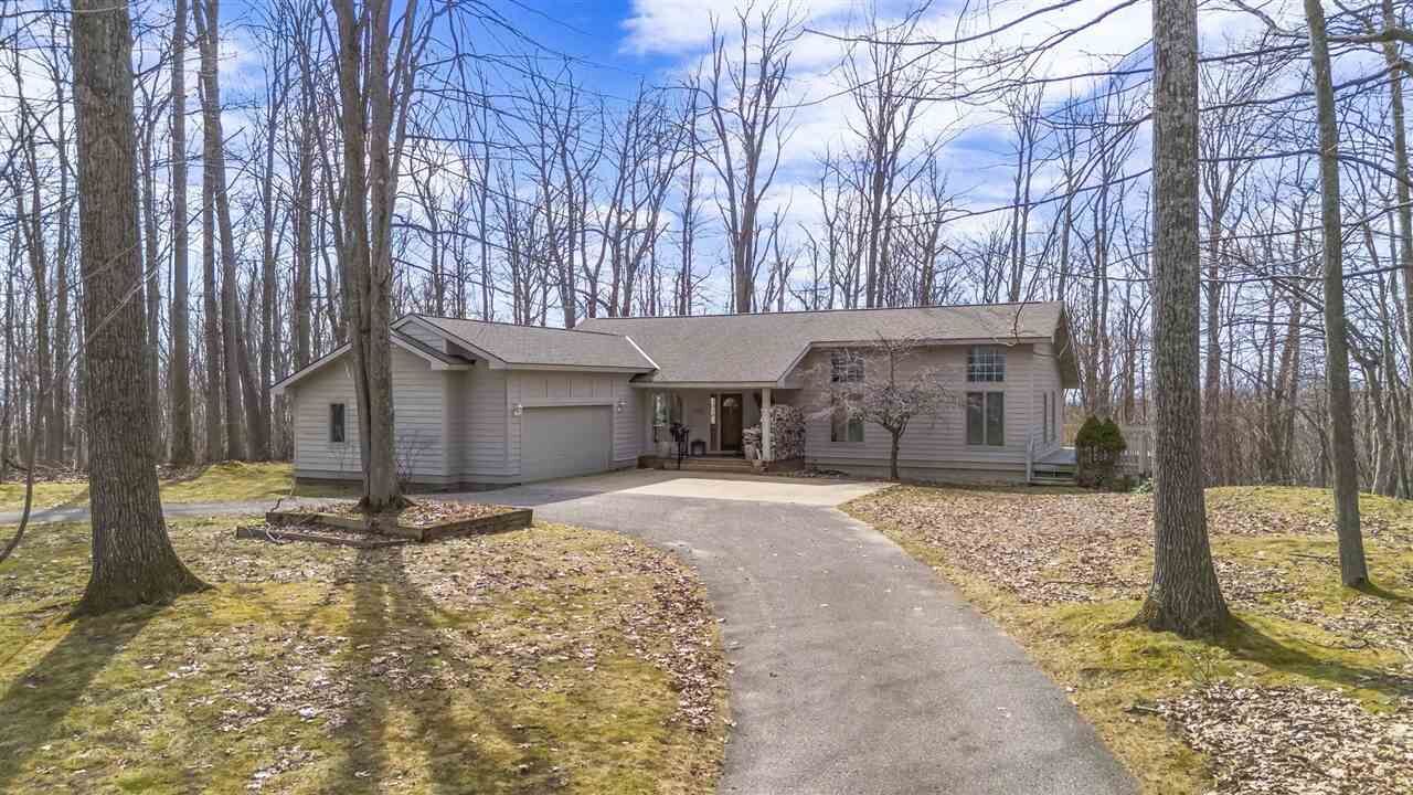 Property Photo:  1826 Bluffs Edge  MI 49740 