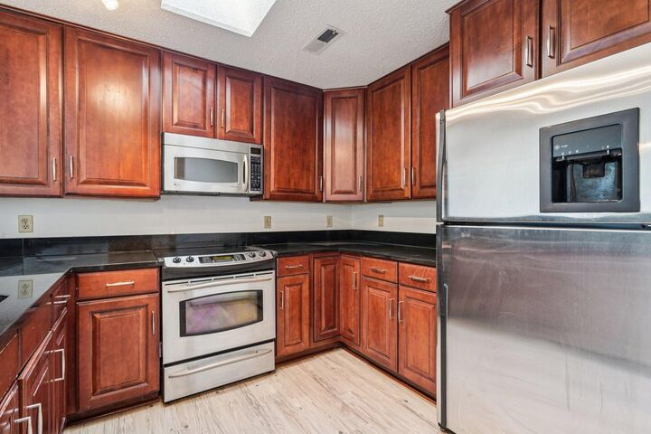 Property Photo:  6145 Chasewood Parkway 202  MN 55343 